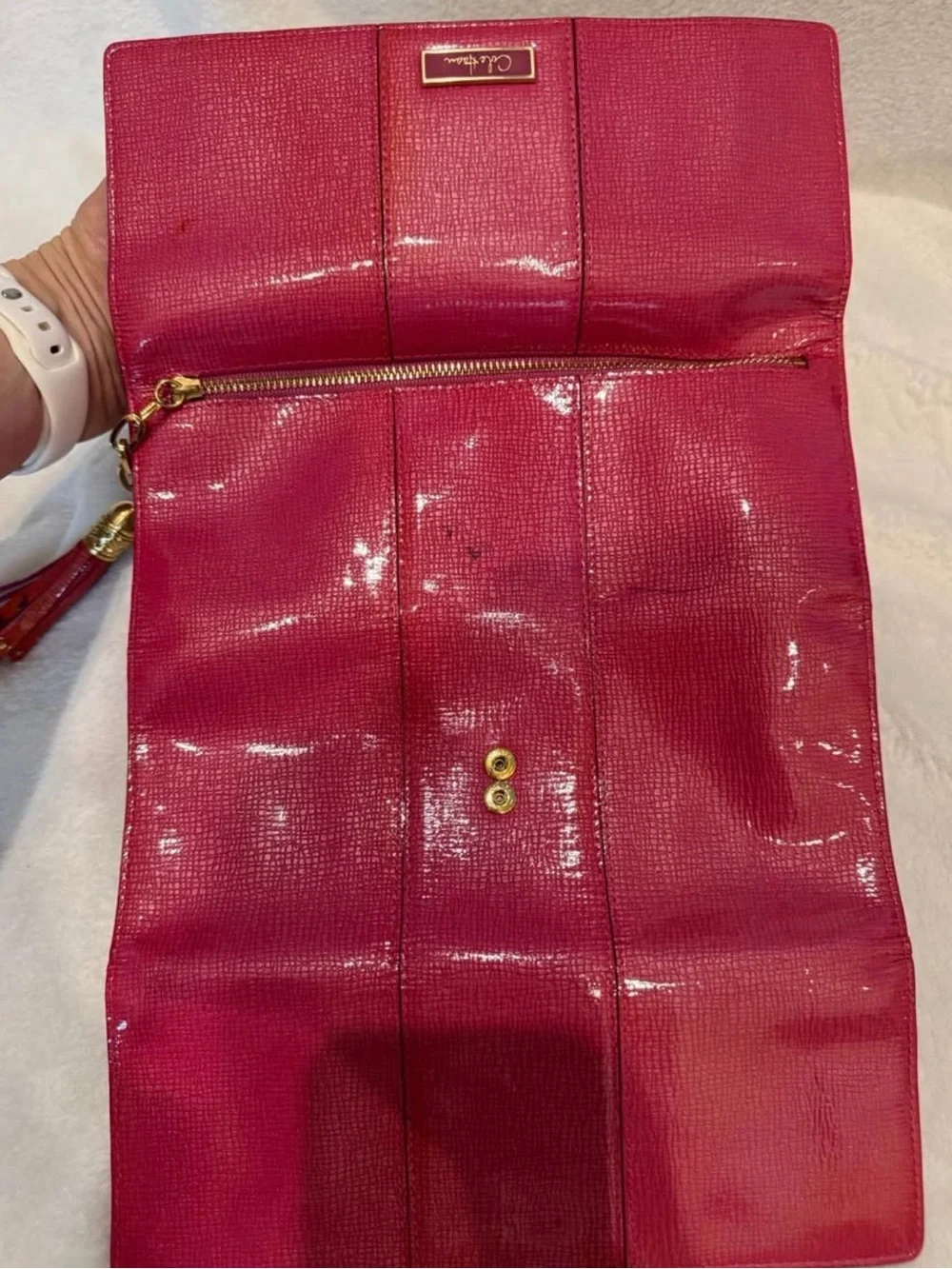 Cole Haan Pink-Red Textured Leather travel jewelry organizer with Gold Logo